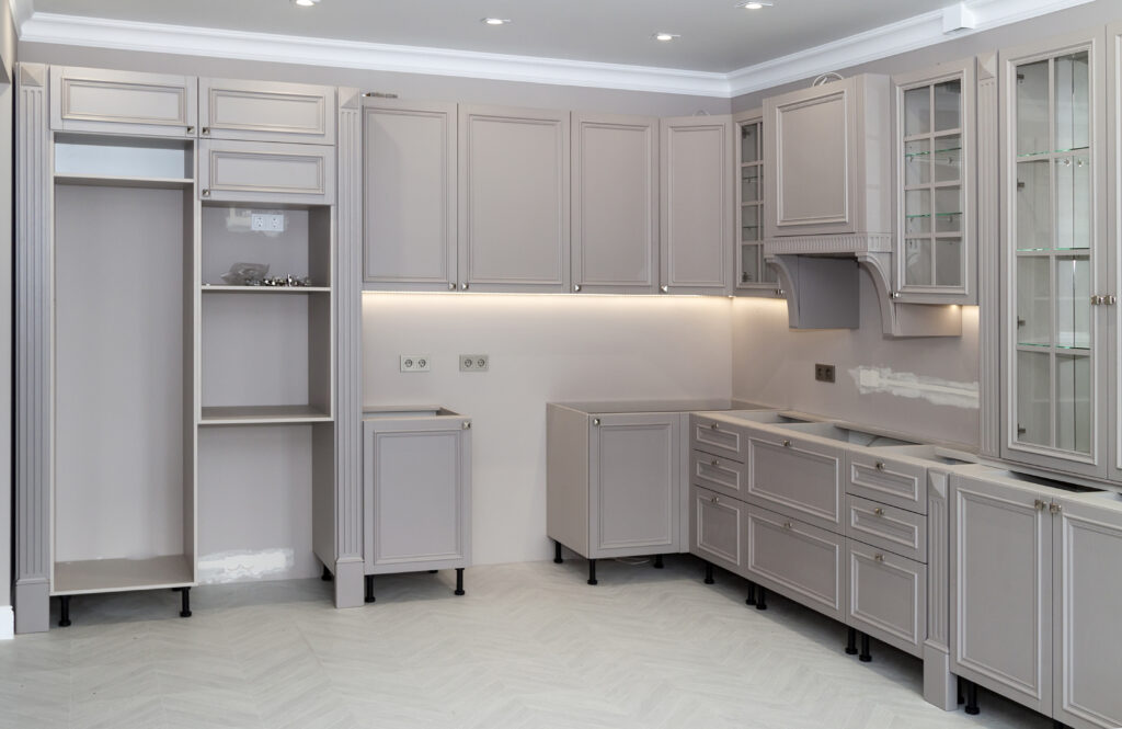 Kitchen cabinets with different colored crown molding