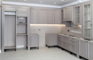 Kitchen cabinets with different colored crown molding